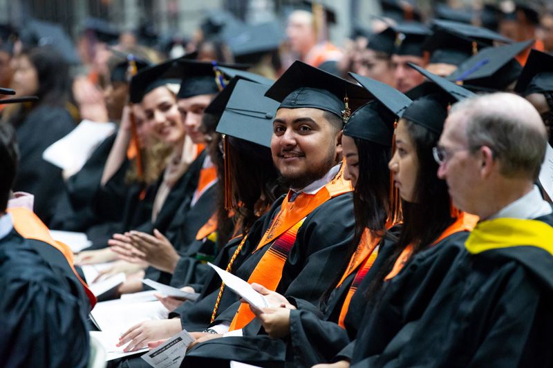 Happy Tulsa Public Schools students at their high school graduation.