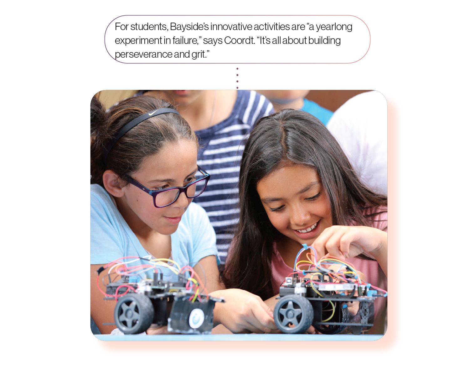 Image: Two young students learning with robots, with the caption 'Kids at Bayside STEAM Academy use 'exploration time' to learn about everything from robotics to birdwatching.'