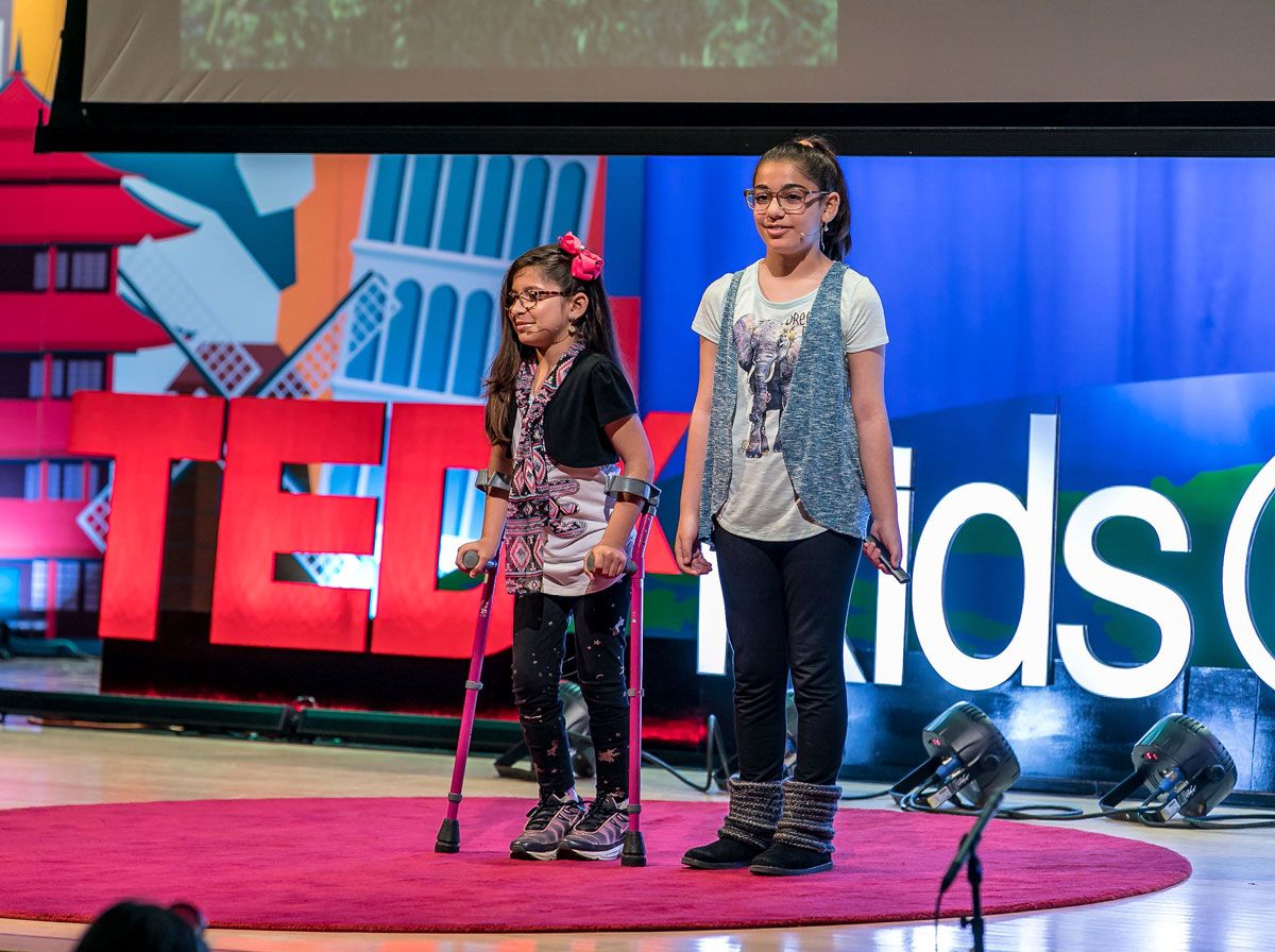 Two students giving a talk as part of TEDxKids