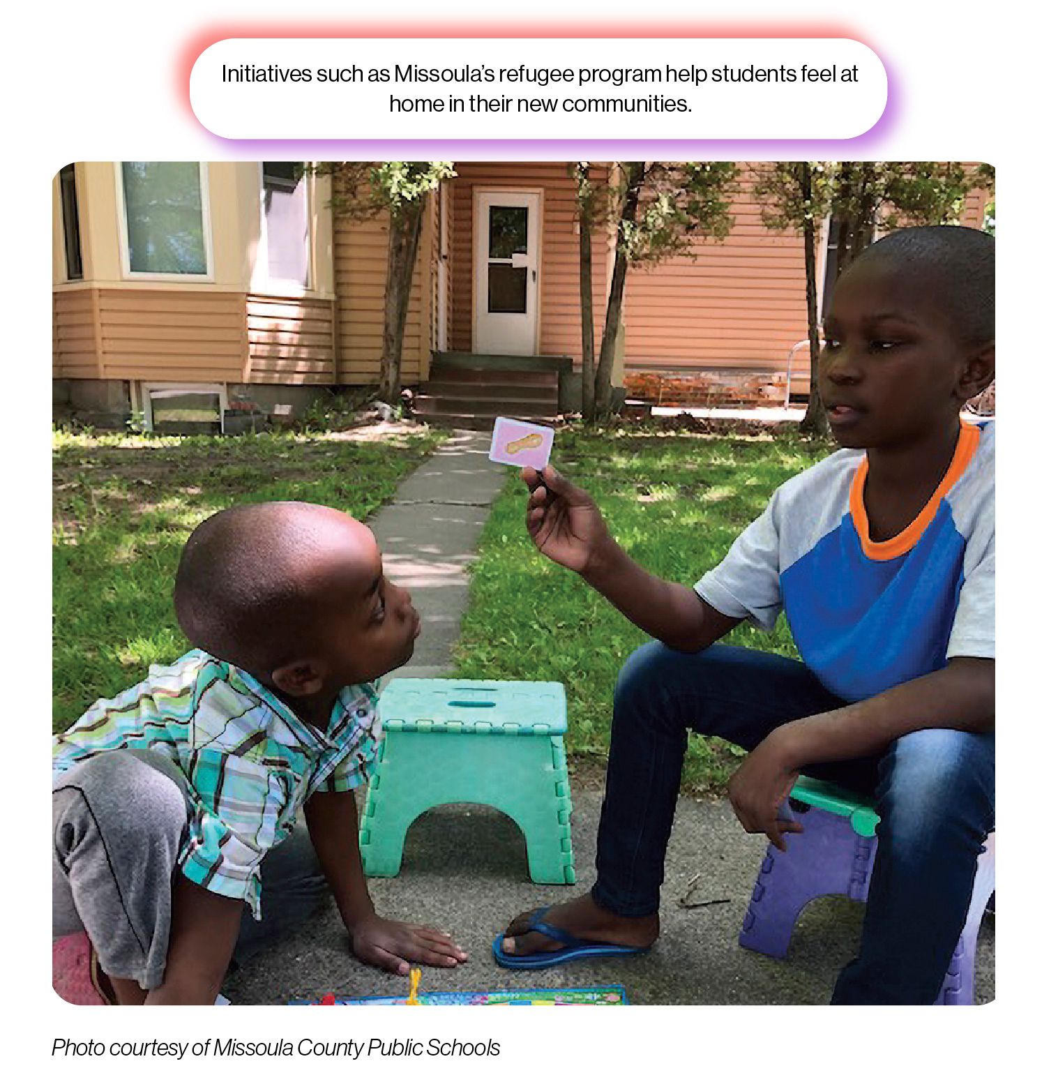 Image: Two young boys play a board game, with the SchoolCEO caption 'Initiatives such as Missoula's refugee program help students feel at home in their new communities.'