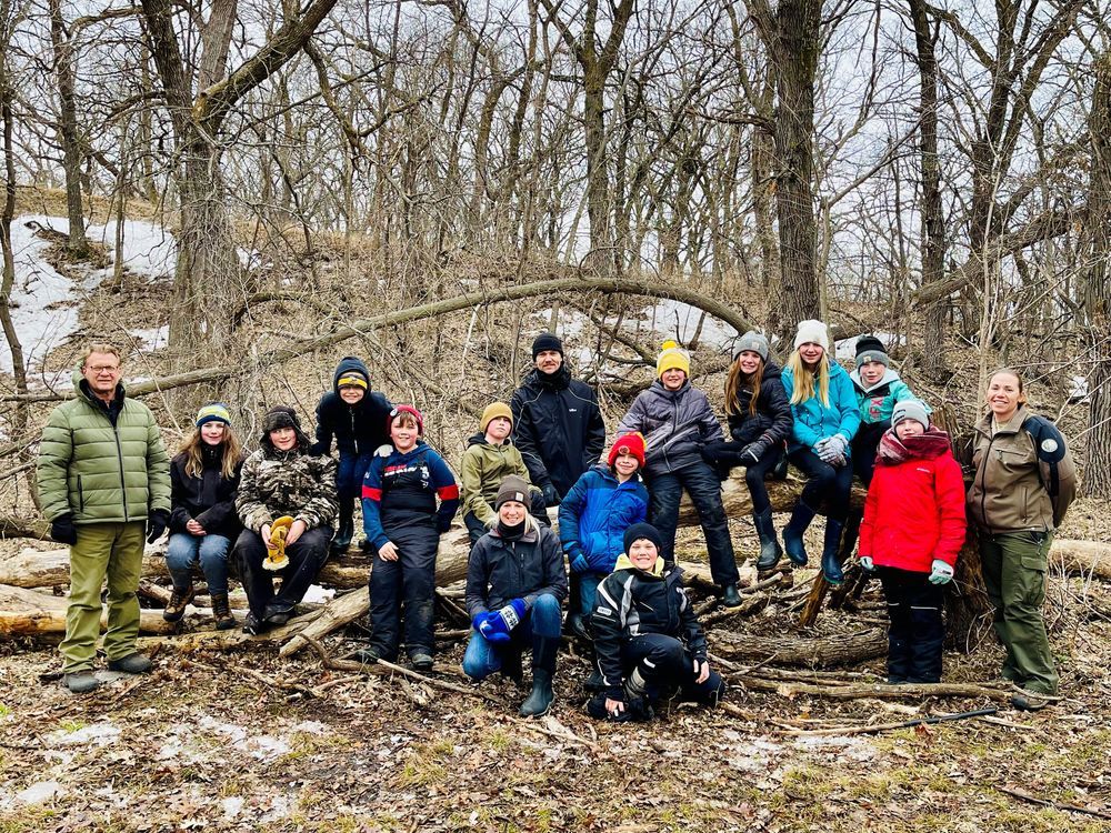 Group of students gathered in the woods at Turtle River State Park